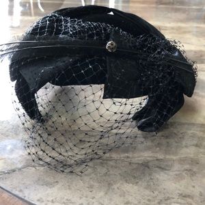 Black velvet/feather women’s hat